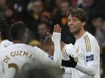 Mæt. Pokaltriumfen for de Guzman, Michu (til højre) og resten af holdet har sammen med den sikre midter placering taget toppen af Swanseas indstilling, så holdet vinder ikke i Norwich, mener Mikkel Petersen. 