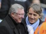 Rivaler. Uniteds Alex Ferguson (t.v.) trak sig sejrrigt 3-2 ud af det første møde med Mancini og City 9. december. 