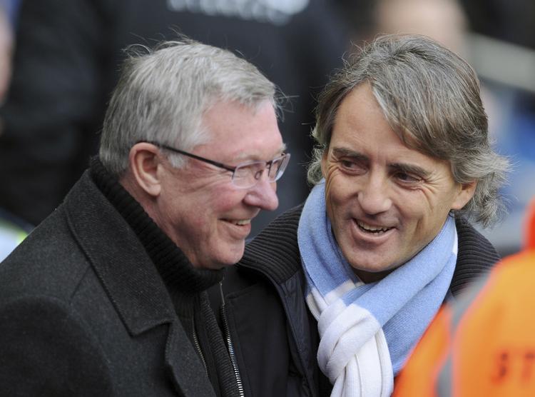 Rivaler. Uniteds Alex Ferguson (t.v.) trak sig sejrrigt 3-2 ud af det første møde med Mancini og City 9. december. 