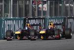 Duel. Vettel (t.v.) 'stjal' sejren fra holdkammeraten Webber for et par uger siden. 