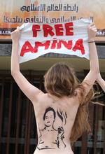 Truet. Femen-demonstranter støtter Amina Tyler på organisationens 'Topløs Jihad Dag', 4. april. 