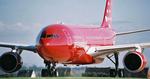 PLADS. I Air Greenlands Airbus, der flyver mellem Danmark og Grønland, har du masser af plads til lemmerne. 