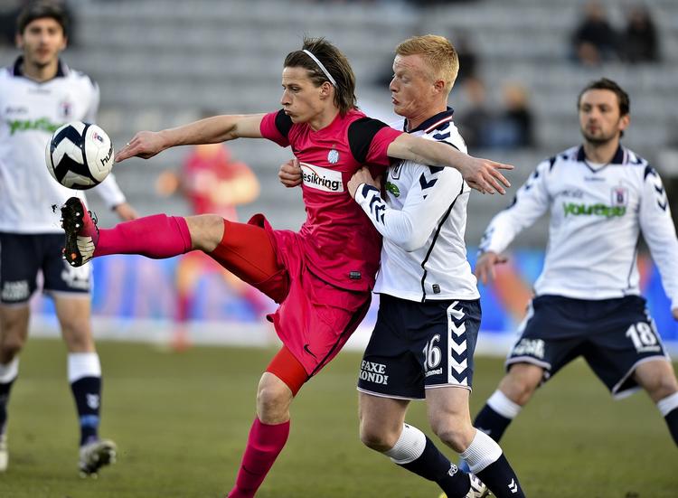 Holdkammerater. Når den nye sæson starter, har Jesper Lange (i rødt) og  Jens Jønsson formentlig samme arbejdsgiver. 
