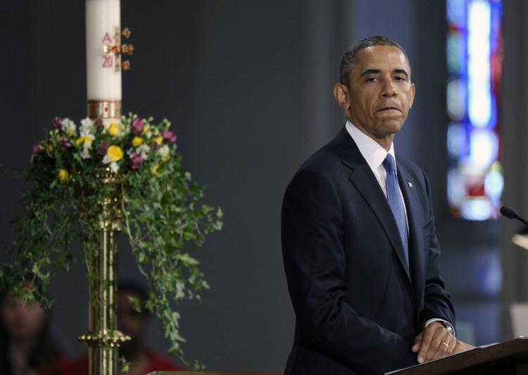 MINDEHØJTIDELIGHED. Barack Obama fotograferet under en ceremoni for Bostons terrorofre i byens katedral. 