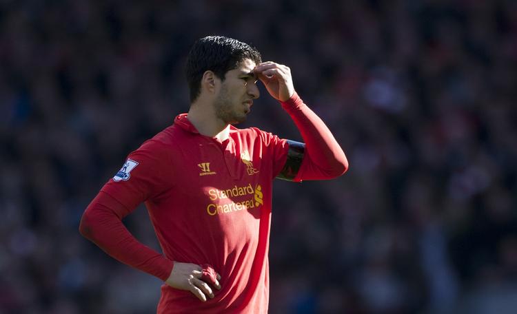 FORBILLEDE. Udsigterne til atter at spille Premier League for Liverpool er lange for Luis Suarez. 