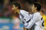 Scoring. Real Madrids Angel Di Maria jubler efter sin scoring i aftenens kamp, der endte 2-1 til madrilenerne. 
