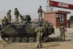 GRÆNSEBY. Tyrkiske soldater i Akcakale, der ligger lige op ad grænsen til det borgerkrigsramte Syrien. 