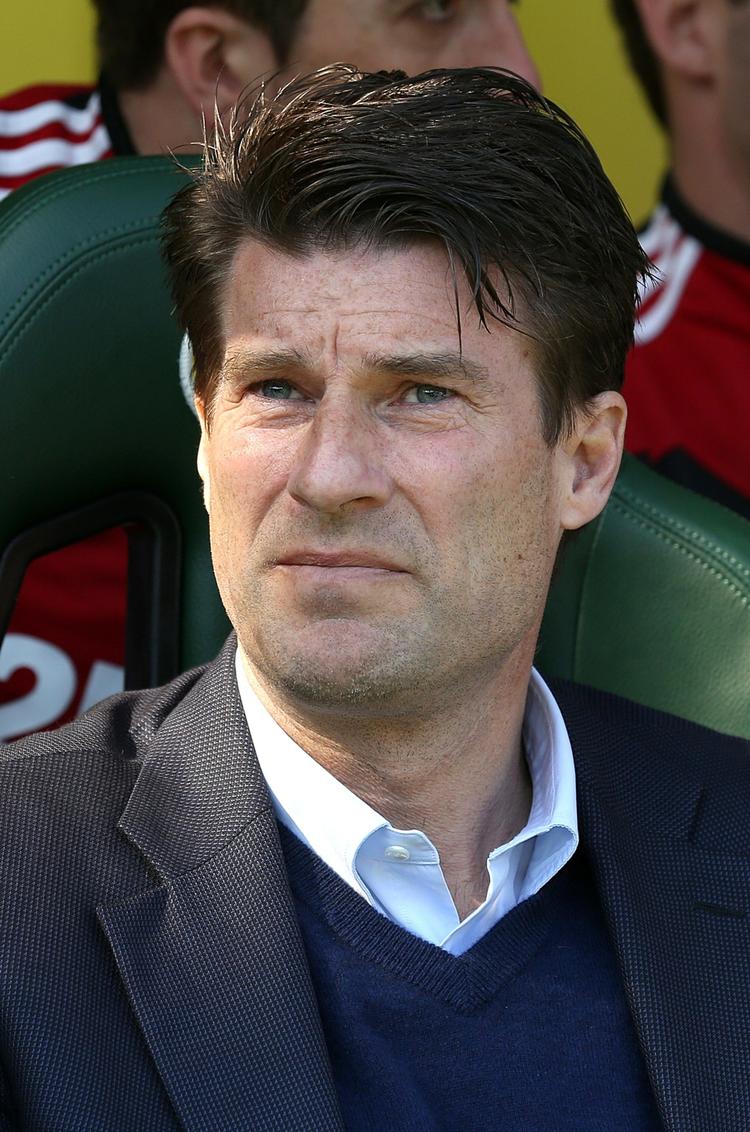 sejr. Swansea City-manager Michael Laudrup var godt tilfreds med igen at være tilbage i sejrherrens rolle efter en intens fight mod Wigan. 