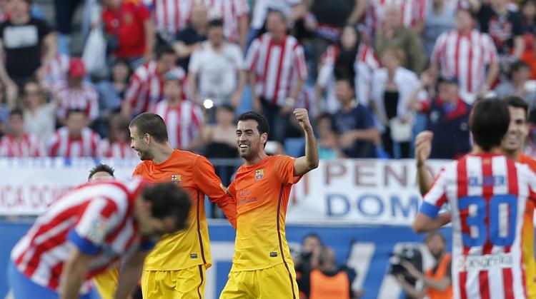 mestre. Barcelona-spillerne havde allerede sikret sig mesterskabet inden kampen søndag mod Atletico Madrid. 