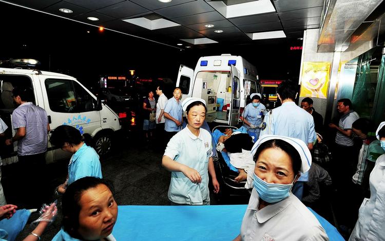 Omfattende. Foxconn har 1,1 millioner ansatte. Her ses nogle af dem efter en eksplosion i 2011. 