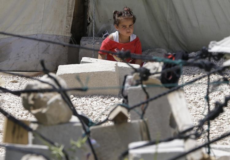 NØDHJÆLP. Meget få flygtninge kommer i disse dage til Jordan. Her er det en 7-årig pige i en flygtningelejr i Libanon, der også har modtaget mange flygtninge. 