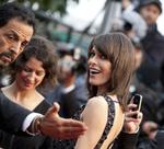 Også den 37-årige amerikanske fotomodel, skuespiller, musiker og modedesigner Milla Jovovich dukkede op til Redfords film onsdag i Cannes. 