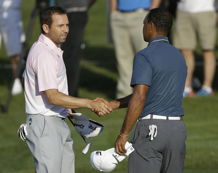 Køligt. Tiger Woods (th) kalder Garcias kommentar for sårende og upassende. 