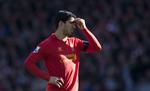 LIVERPOOL-SPILLER. Selv om han starter sæsonen med karantæne, er Luis Suarez også Liverpoolspiller efter sommerferien, fastslår Brendan Rodgers. 
