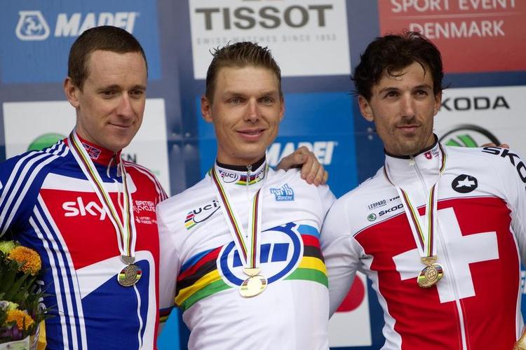 tempokanoner. Tony Martin (midt) vandt VM i enkelstart 2011 i København foran Bradley Wiggins (tv) og Fabian Cancellara. 