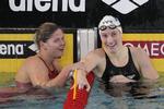 træningskammerater. I Nice træner Lotte Friis (tv.) til daglig sammen med blandt andre kortbaneeuropamesteren i 400 meter fri, Camille Muffat (th.). 