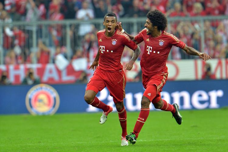 Hovedpersoner. Dante (th) og Gustavo er angiveligt blevet truet med udelukkelse fra landsholdet for altid, hvis de var blevet i Tyskland for at spille pokalfinale for Bayern München. 