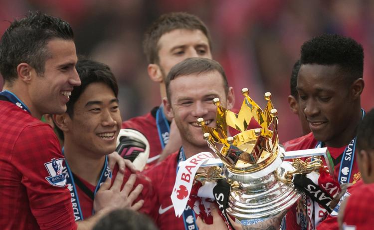 klubskifte? Selv om Wayne Rooney (midt) var glad for Manchester Uniteds mesterskabstitel, så er angriberen ikke tilfreds med sin rolle på holdet. 
