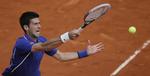 overbevisende. Novak Djokovic slog sig videre til kvartfinalen i French Open, hvor veteranen Tommy Haas venter. 