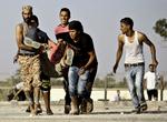 Libyen. Blodige kampe ved det tidligere hovedkvarter for oprørgruppe i Benghazi. 