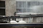 Brand. Slukningsarbejdet var her til middag endnu i gang ved en bygning i Frederiksssund. 