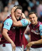 Mester. Med 10  scoringer i sæsonen var West Ham-anfører Kevin Nolan (tv) en af de målfarligste engelske spillere i Premier League. 