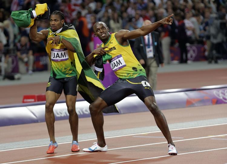Rivalisering. Yohan Blake (tv) kan ånde lettet op og kan koncentrere sig om sit VM-titelforsvar, mens Usain Bolt skal finde vejen til VM på 100 meter via de jamaicanske udtagelsesmesterskaber. 