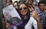 Vinder. Jubel i Iran efter at den 64- årige moderate præst Hassan Rohani vandt valget. 
