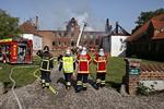 STORBRAND. Brandfolk ved den udbrændte hovedbygning på Sparresholm Gods. 
