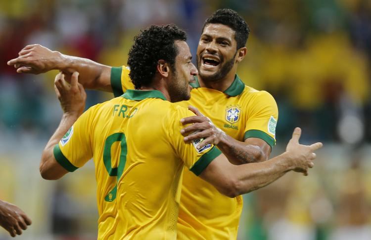 Sejr. Brasilianske Fred fejrer holdets tredje finalemål. 