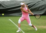 Træning. I et opsigtsvækkende antræk gennemførte Caroline Wozniacki søndagens træning i Wimbledon. 