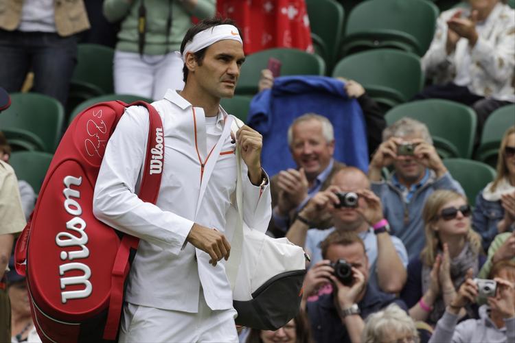 rent. Roger Federer fik ikke meget sved på panden i sin første optræden i år på Wimbledons plæner. 