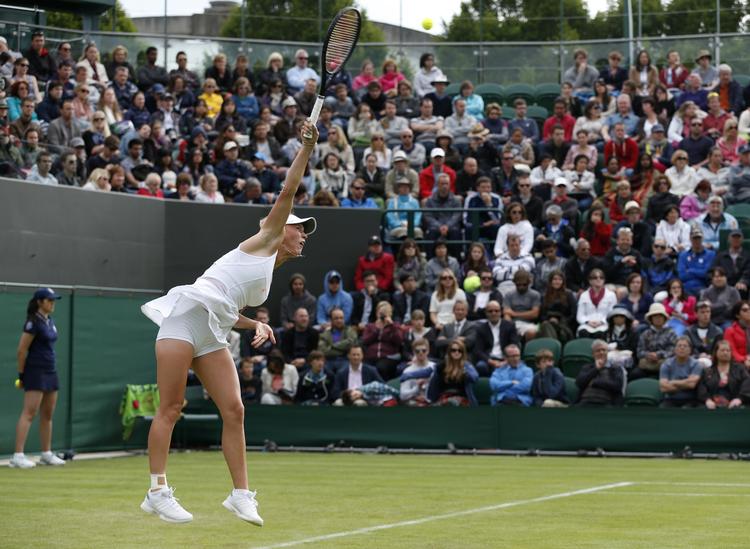 VIDERE. For anden gang i Wimbledon uddelte Caroline Wozniacki et æg, da hun vandt sin kamp i 1. runde. 