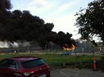 Røg. Røgskyer tætte som fløjl svæver over Ydre Østerbro, hvor der er gået ild på en byggeplads. 