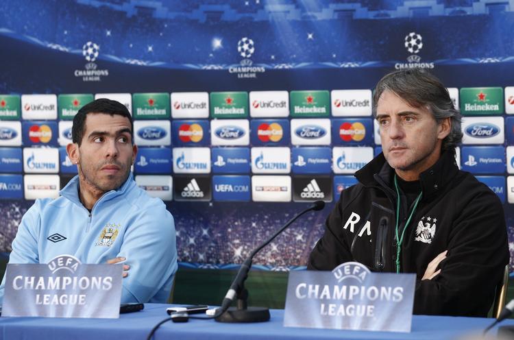 Fortid. Carlos Tevez og Roberto Mancini er begge færdige i City. Deres forhold kulminerede negativt, da Tevez under en Champions League-kamp i 2011 næstede at gå på banen mod Bayern München. 