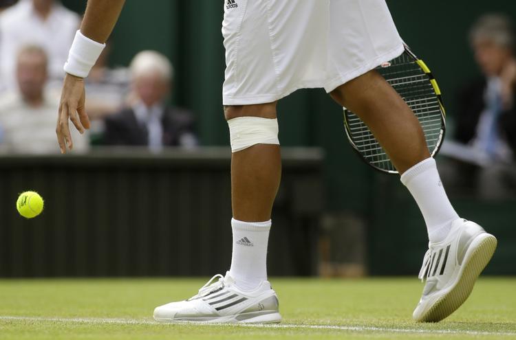 Skadet. En af de syv spillere, der trak sig skadet ud af Wimbledon i dag, er franskmanden Jo-Wilfried Tsonga. 