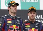 pres. Sebastian Vettel (th) blev ikke populær, da han ignorerede en team-ordre og overhalede holdkammeraten Mark Webber (tv), som ellers lå til sejr. 
