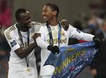 nøglespiller. Swansea City vandt sidste sæson ligacuppen på mål af blandt andre Jonathan de Guzman (th) i finalen mod Bradford. 