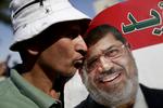Selv om der bliver jublet på tilhænger. Tahrir-pladsen over militærkuppet mod Mohamed Morsi, så har den nu tidligere egyptiske præsident stadig mange tilhængere. 