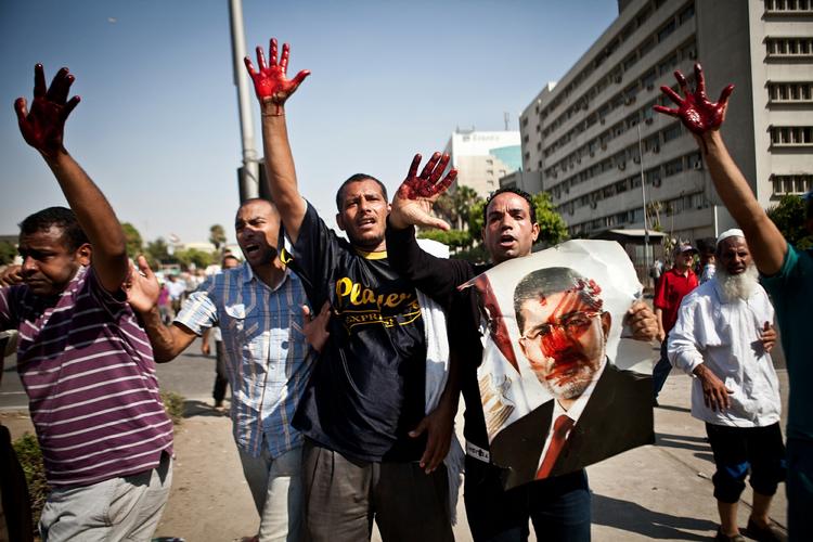 støtte. Flere steder i Kairo var der i dag demonstrationer til støtte for den afsatte præsident Mohammed Morsi. 