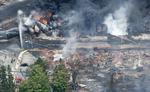 afsporet. Et godstog med råolie satte sig pludselig i bevægelse og kørte ned i byen Lac-Mégantic, hvor det blev afsporet i en række af eksplosioner. 