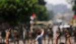 Kamp. Tilhængere af den afsatte præsident, Mohamed Morsi, demonstrerer på gaden i Egypten. Her til morgen endte en demonstration i et blodbad, da politi og militær åbnede ild mod demonstranterne. 