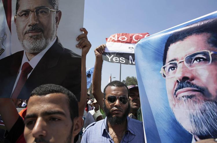 Støtter. Tilhængere af den afsatte præsident Mohamed Morsi  er på gaden i Kairo. 