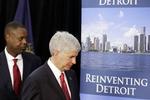 Konkurs. Detroit i Michigan er endnu ikke begæret konkurs. Statens guvernør Rick Snyder (til højre) samt Kevyn Orr, der er udnævnt til kriseleder begærede ellers byen konkurs i sidste uge. 
