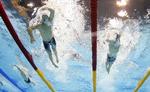 FINALISTER. Ved OL svømmede Pál Joensen (th.) side om side med den senere guldvinder i 1.500 meter fri, kineseren Sun Yang (tv.). I aften er de begge VM-finalister i 800 meter fri. 