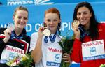 BESEJRET. I 2009 satte Annamay Pierse (tv.) verdensrekord i 200 meter brystsvømning i semifinalen, men tabte i finalen til Nadja Higl (i midten), mens Mirna Jukic (th) vandt bronze. 