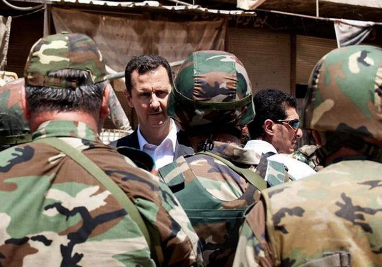Krigsretorik. De syriske  oprørere skal knuses med magt, siger Assad. Ny vil FN  undersøge om der er brugt kemiske våben i borgerkrigen. 