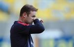 utilfreds. Wayne Rooney har ikke været tilfreds med den nye rolle, han er tildelt i Manchester United, efter klubben har købt Robin van Persie. 