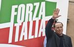 Slagen. Berlusconi taler til sine tilhængere i Rom. 