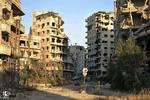 I Jouret al-Shiyah-området i Homs står højhusene som tomme skaller efter intensiv beskyding. 